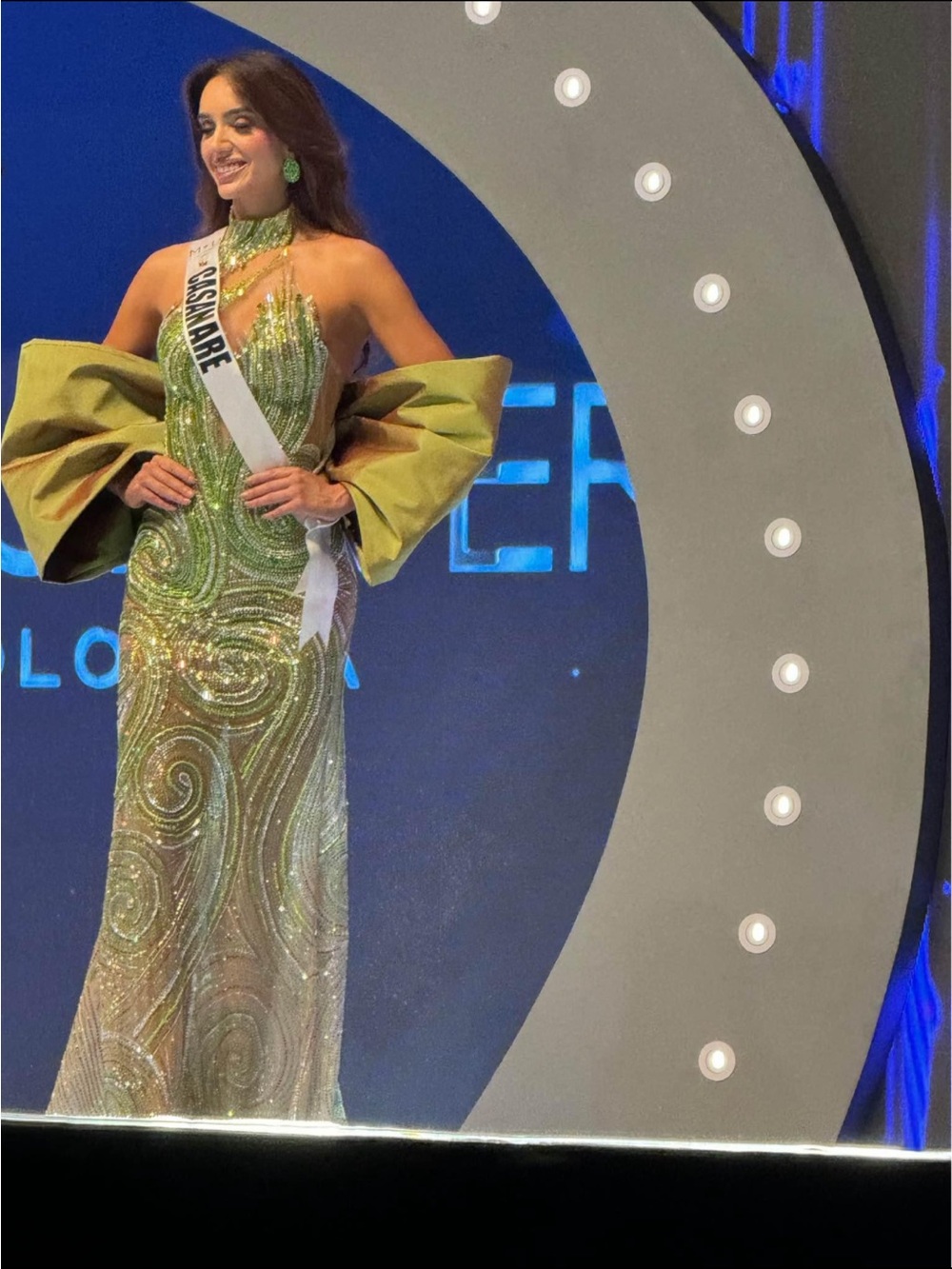 Green Sequin Halter Prom Gown with Dramatic Sleeve Detail